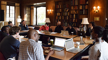 scholars engaging in discussion